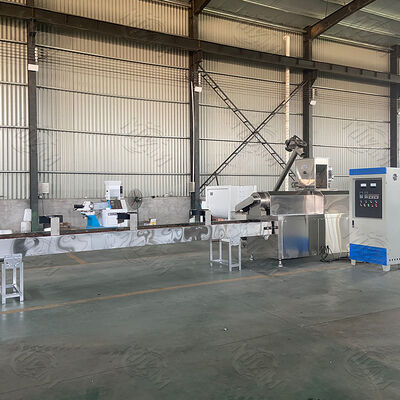 Extrudeuse à double vis avec une capacité de 100-1000 kg/h pour ligne de production d'aliments pour animaux de compagnie en acier inoxydable de qualité alimentaire et système de contrôle entièrement automatique